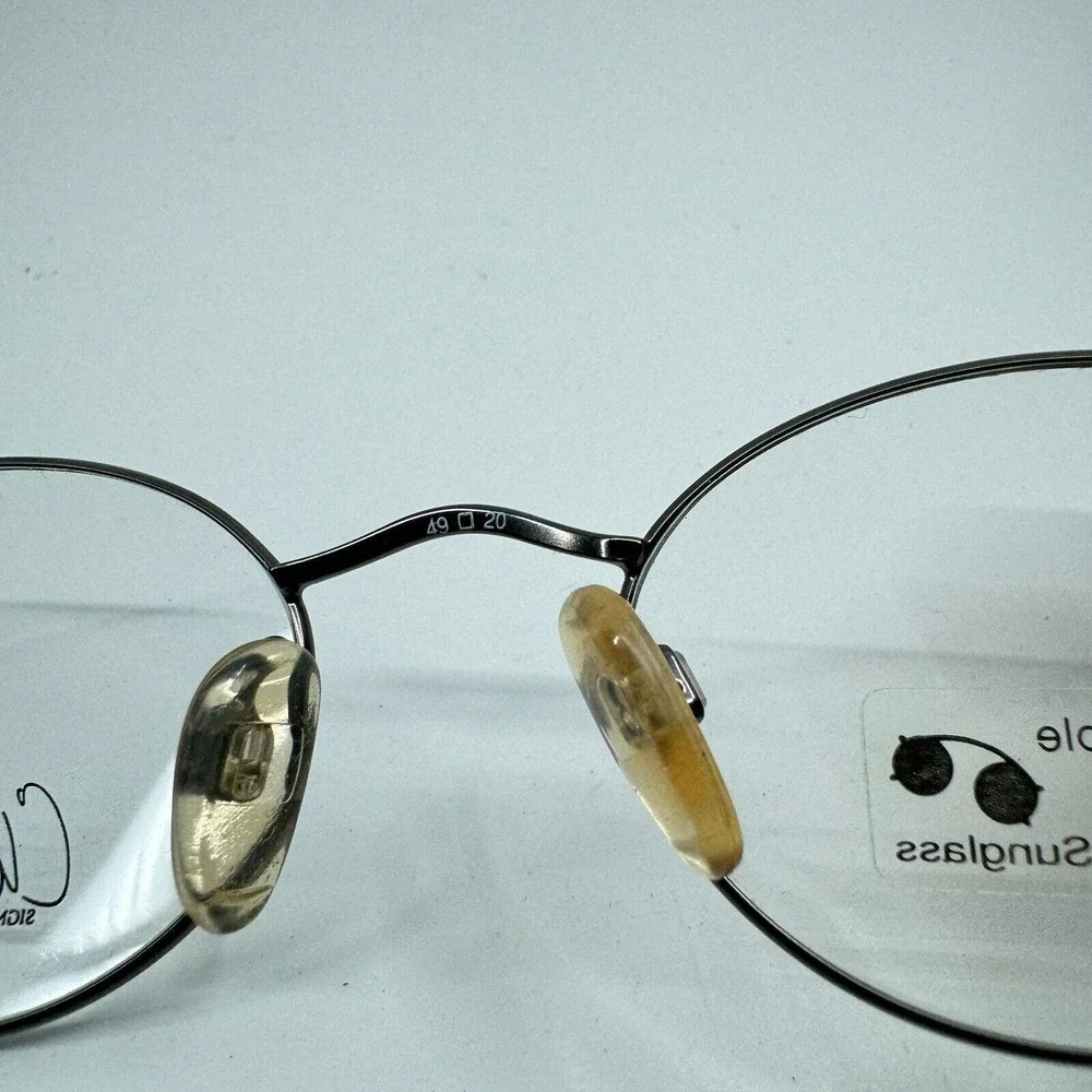 Kenmark Eyeglasses Frames Gallery‎ Silver Round Tortoise 49-20-140 H11133